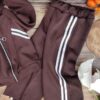 2026/09/1000017240.jpg Dres dwuczęściowy z lampasami